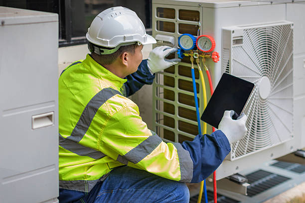 Professional Hvac technician working in Auburn, AL